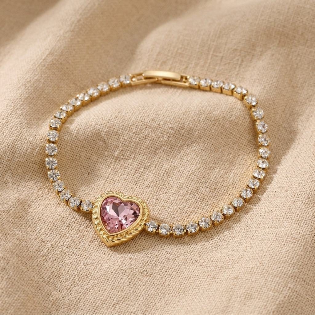 Dainty Stone Heart & Crystal Bracelet displayed on a textured beige fabric background.