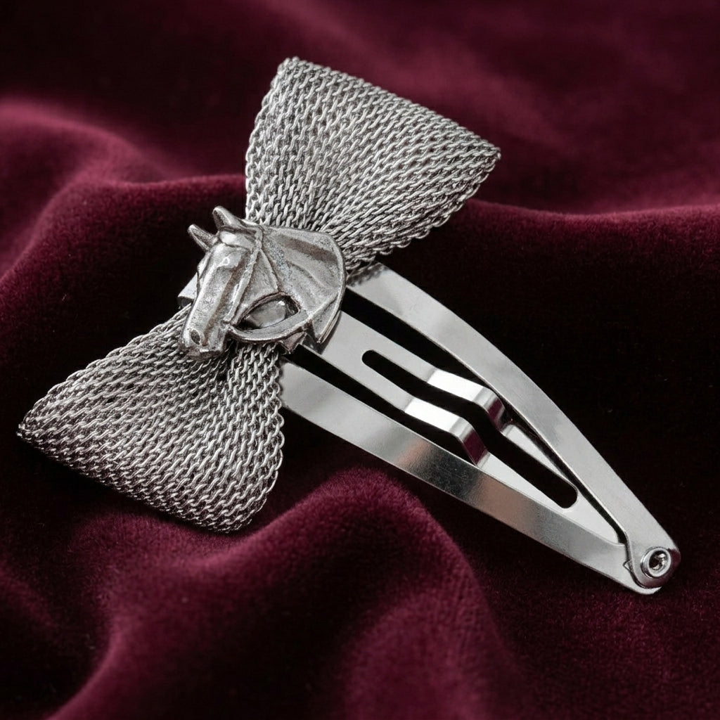 Mesh Bow Horse Head Snap Hair Clip on a maroon fabric background