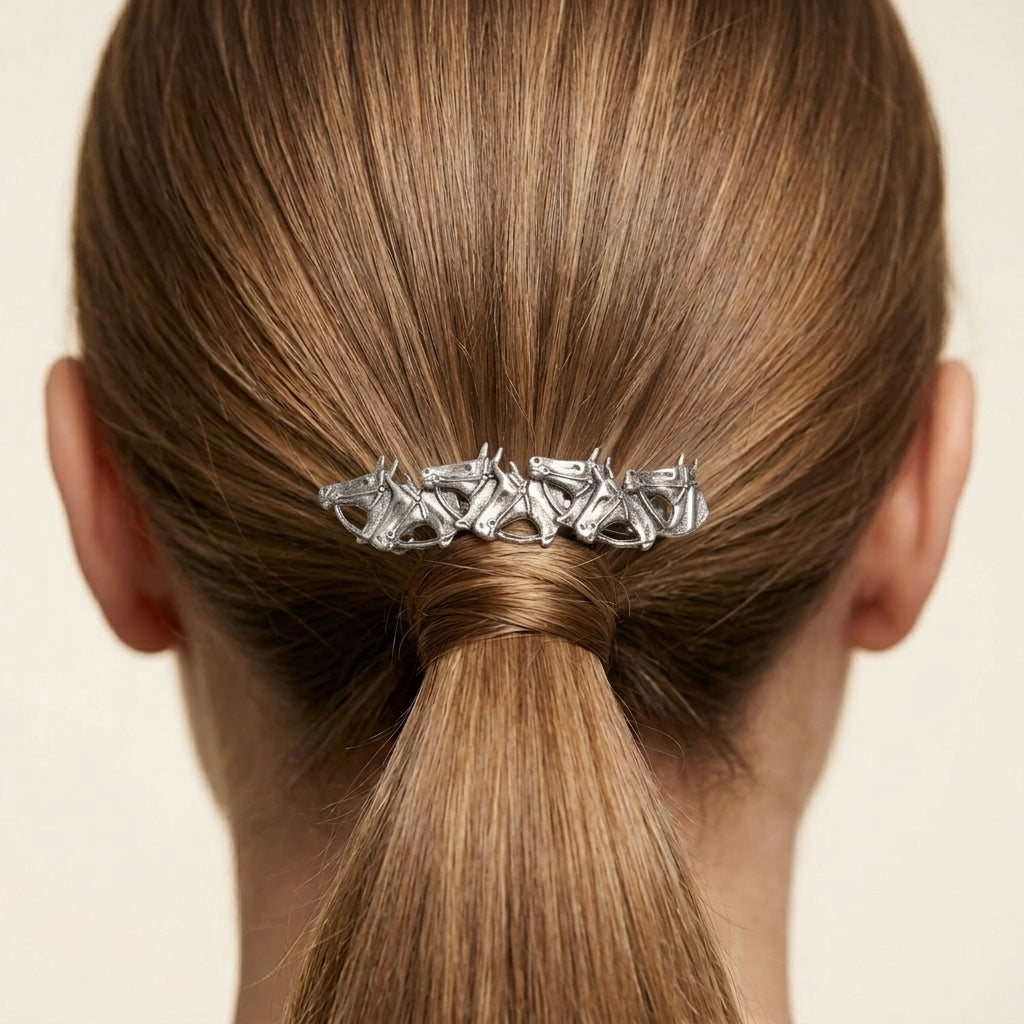 Racing Horses Antiqued Hair Barrette on a person's ponytail against a neutral background