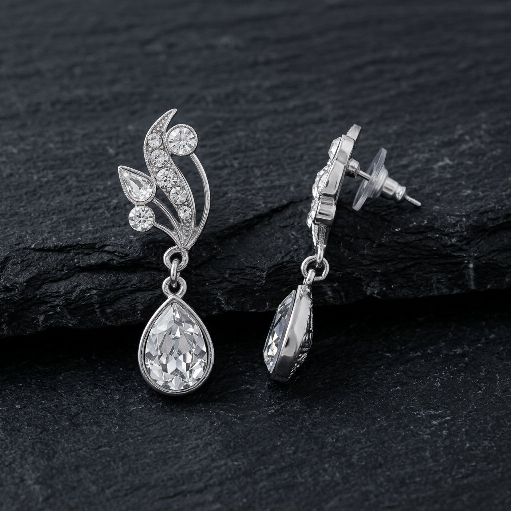 Antiquities Couture Austrian Crystal Vine Teardrop Earrings on a black stone surface