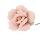 Pair of pink rose-shaped earrings on a white background