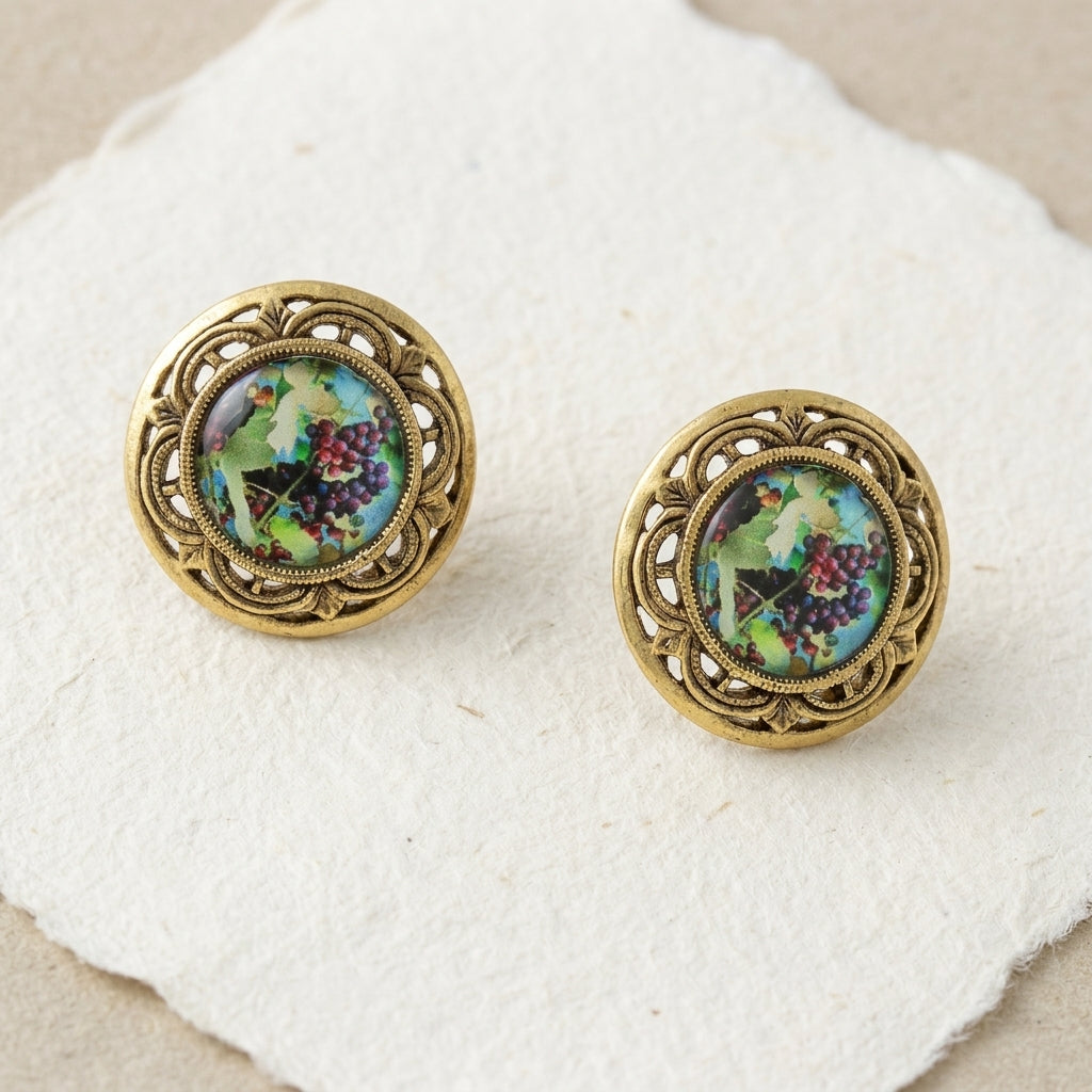 Winery Grapes Decal Round Post Earrings displayed on a textured off-white paper surface.