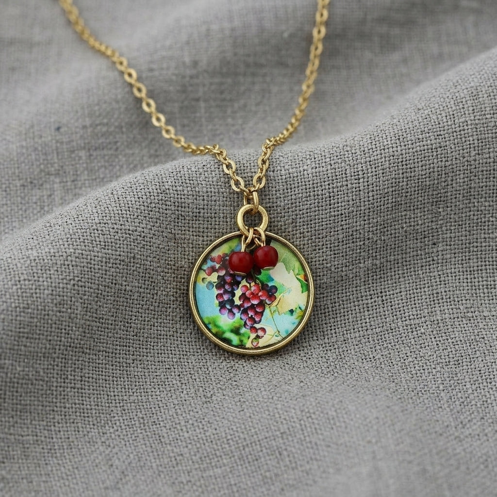 Winery Round Grapes Decal Pendant Necklace 16" + 3" Extender resting on gray linen fabric
