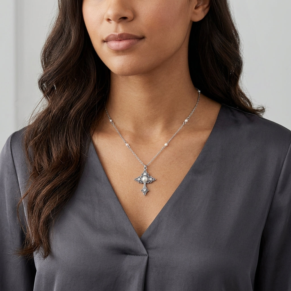 Woman wearing a Filigree Cross With Faux Pearl Crystal Accent Pendant Necklace