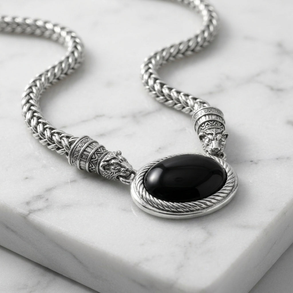 Antiquities Couture Jaguar Black Onyx Stone Symmetry Necklace on a marble surface