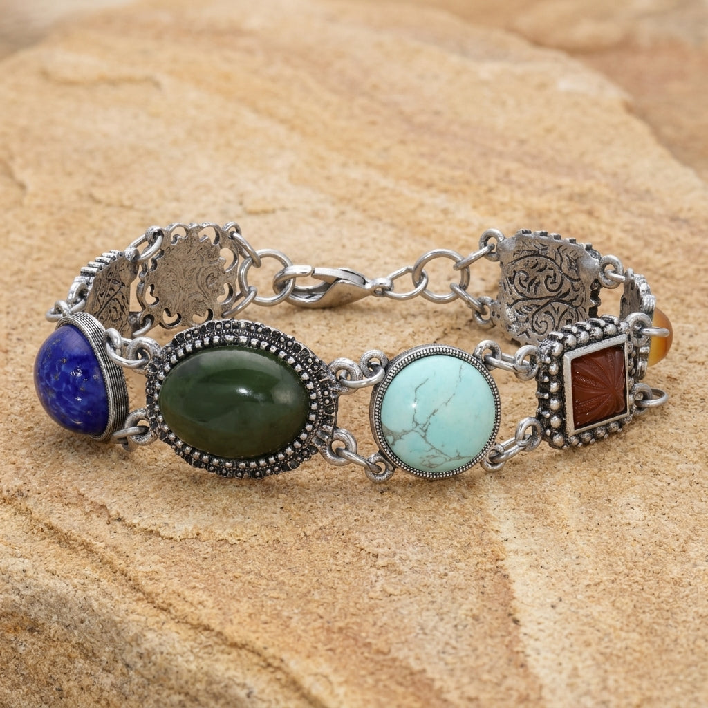 Multicolored gemstone bracelet on a textured beige surface