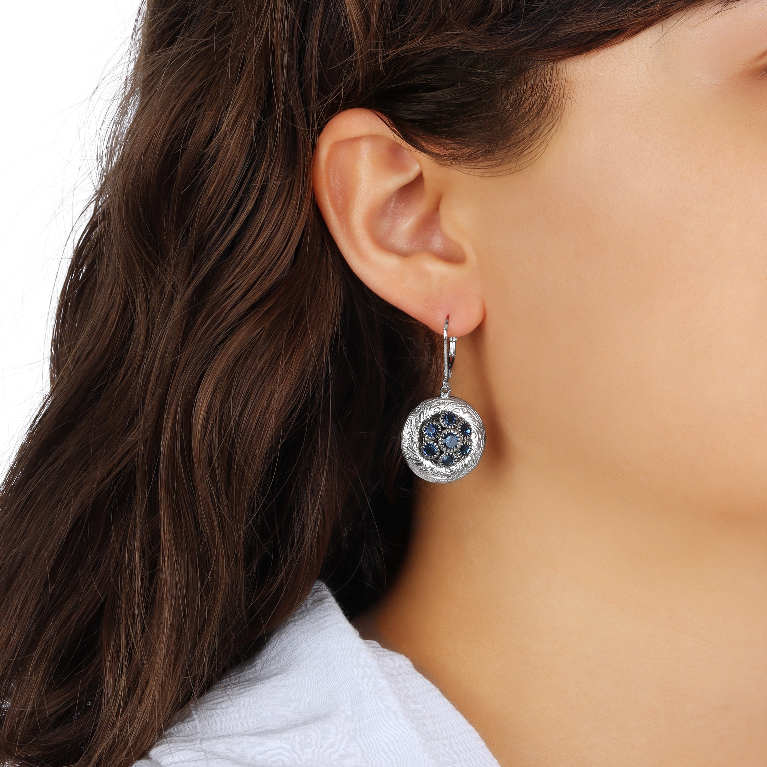 Close up of a woman wearing Round European Montana Blue Crystal Glass Stone Cluster Drop Earrings