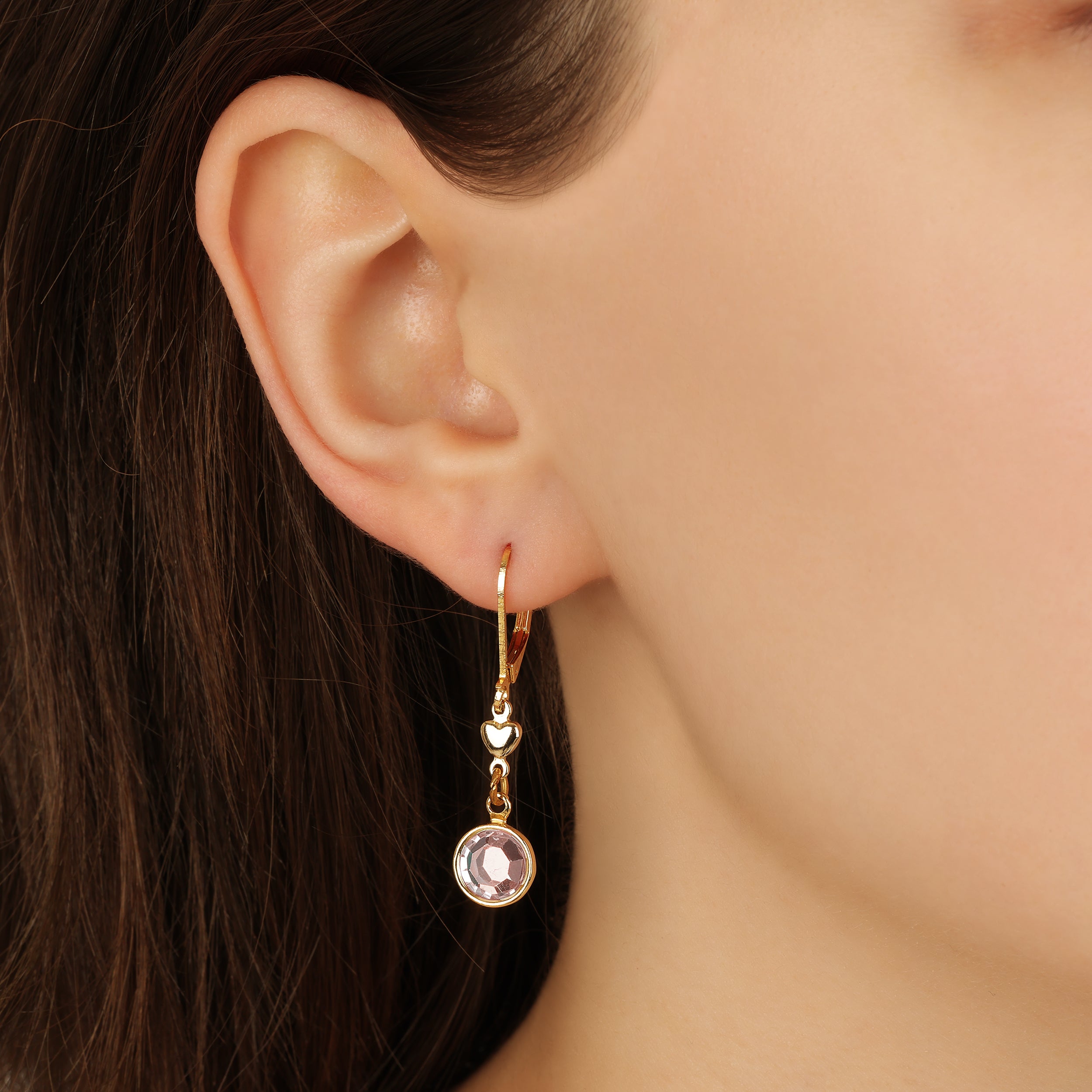 Close up of a woman wearing Golden Heart Channel AB Crystal Drop Earrings