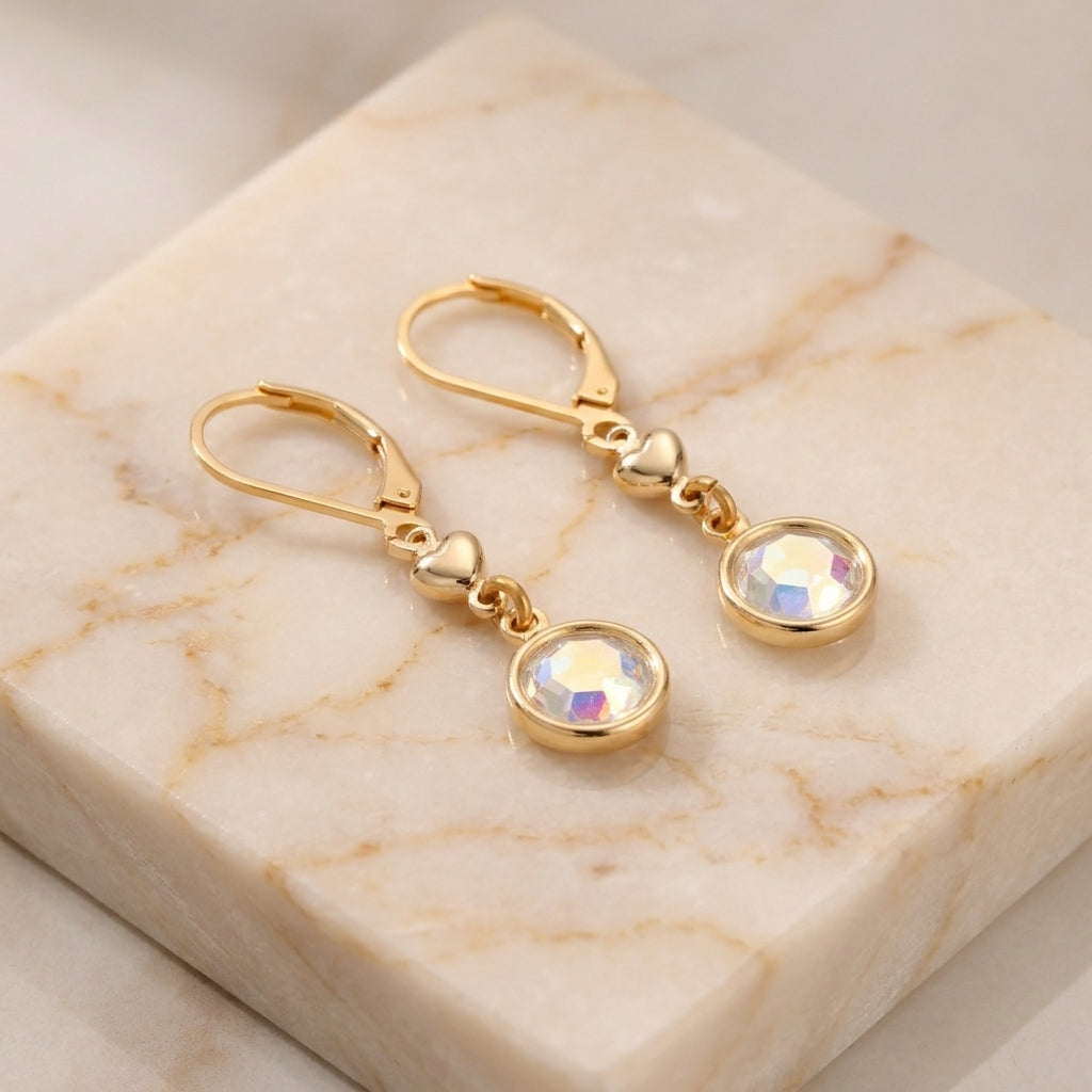 Golden Heart Channel AB Crystal Drop Earrings on champagne colored marble