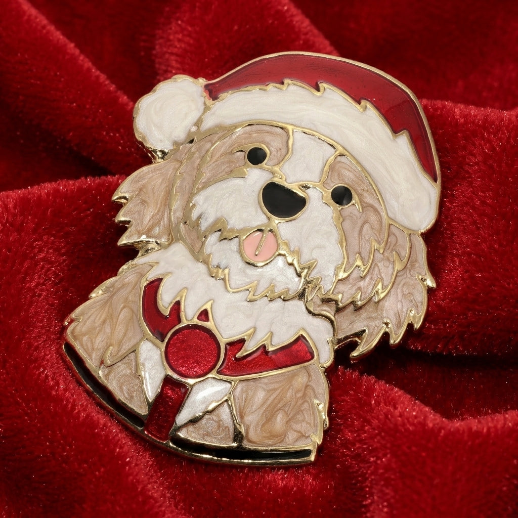 Puppy in a Santa outfit brooch resting on red satin fabric