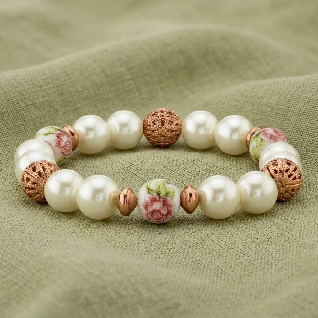 Rose Faux Pearl Purple Flower Filigree Beaded Stretch Bracelet on a textured green fabric background
