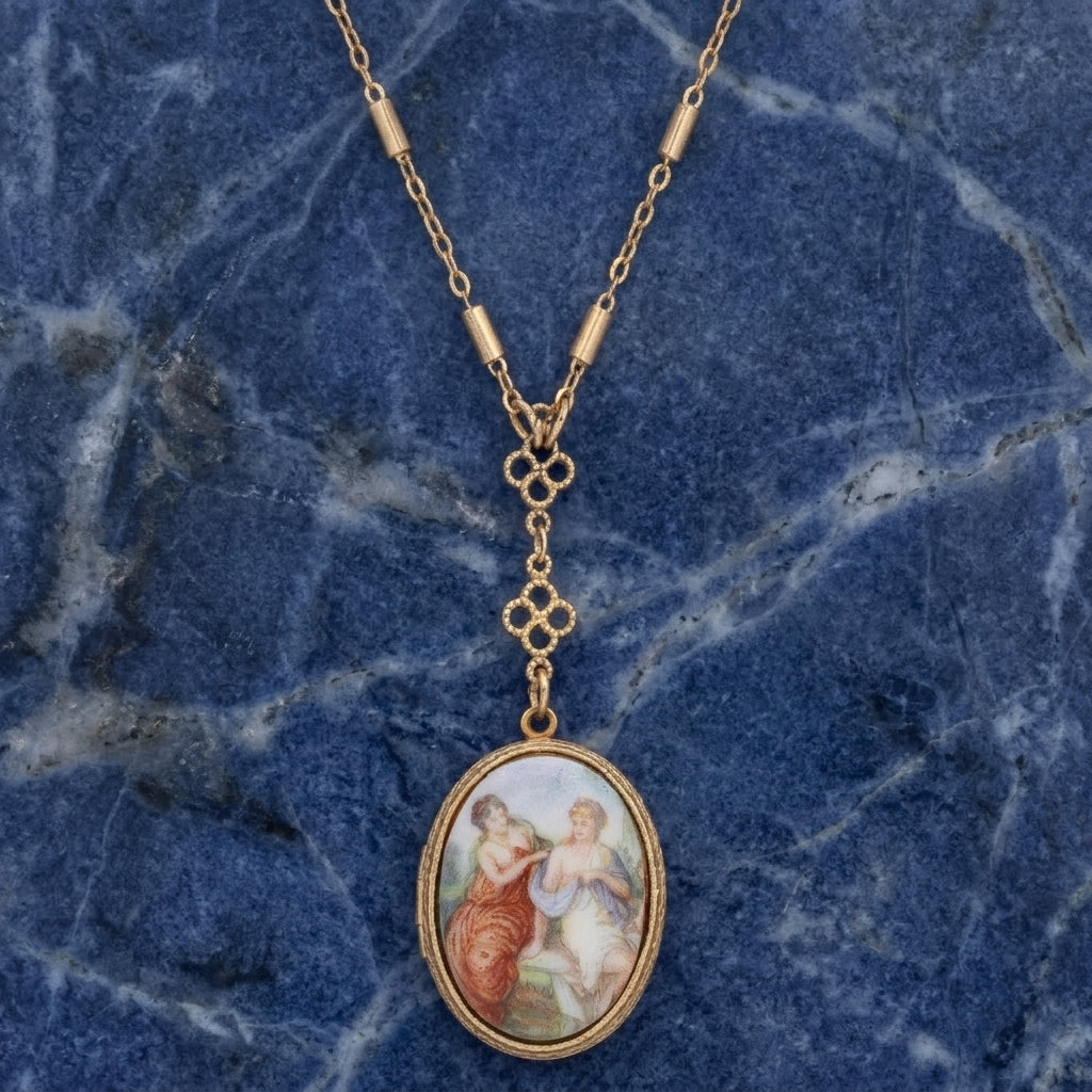 Gold tone Pre-Raphaelite Art Inspired Locket Necklace resting on blue marble stone