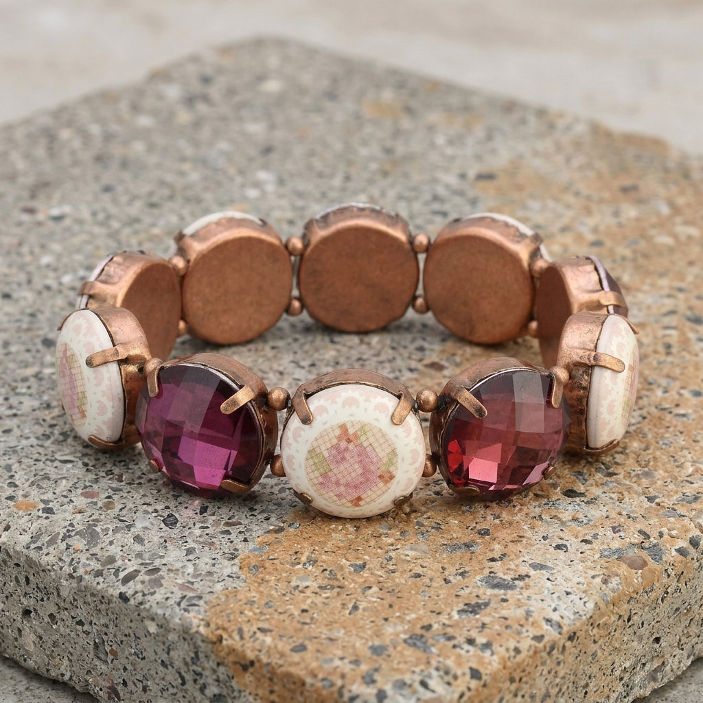 Vintage Floral Round Stone Stretch Bracelet on a textured stone surface