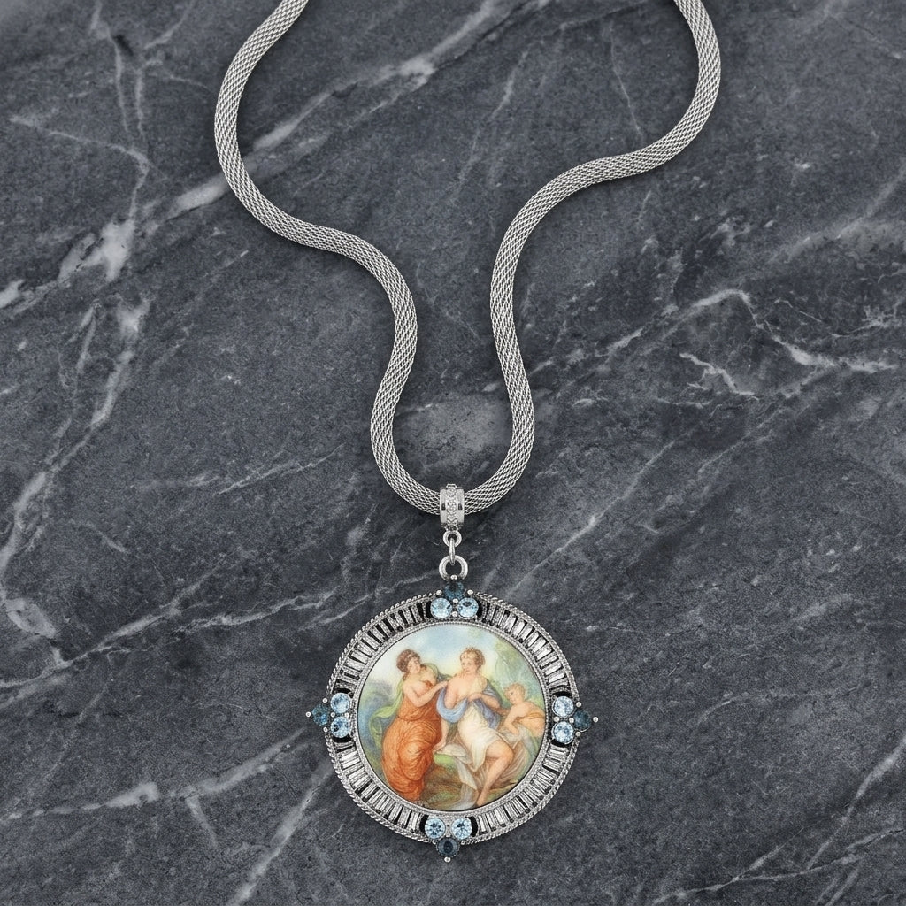 Blue Crystal Rubenesque Glass Pendant Mesh Necklace on a dark marble surface