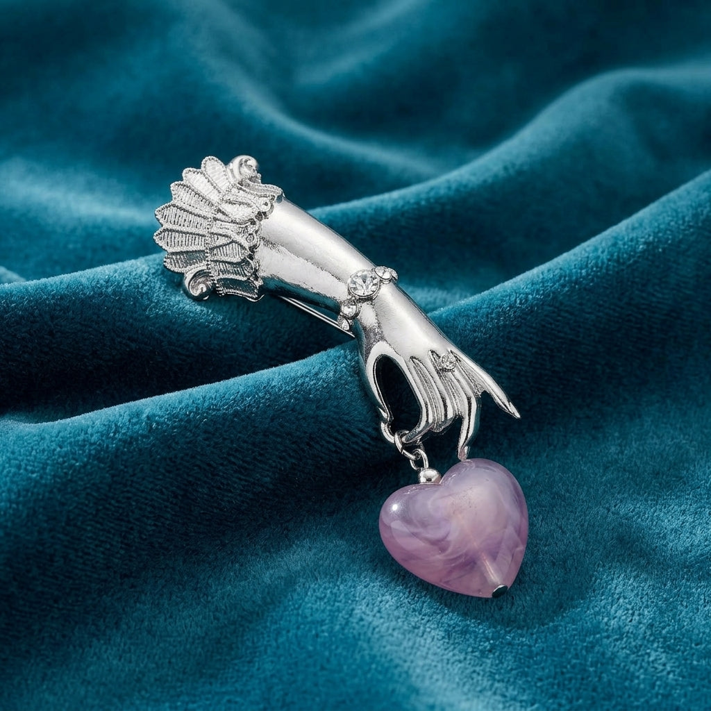 Belle Epoch Ladies Hand Light Purple Bead Heart Drop Pin on a blue fabric background