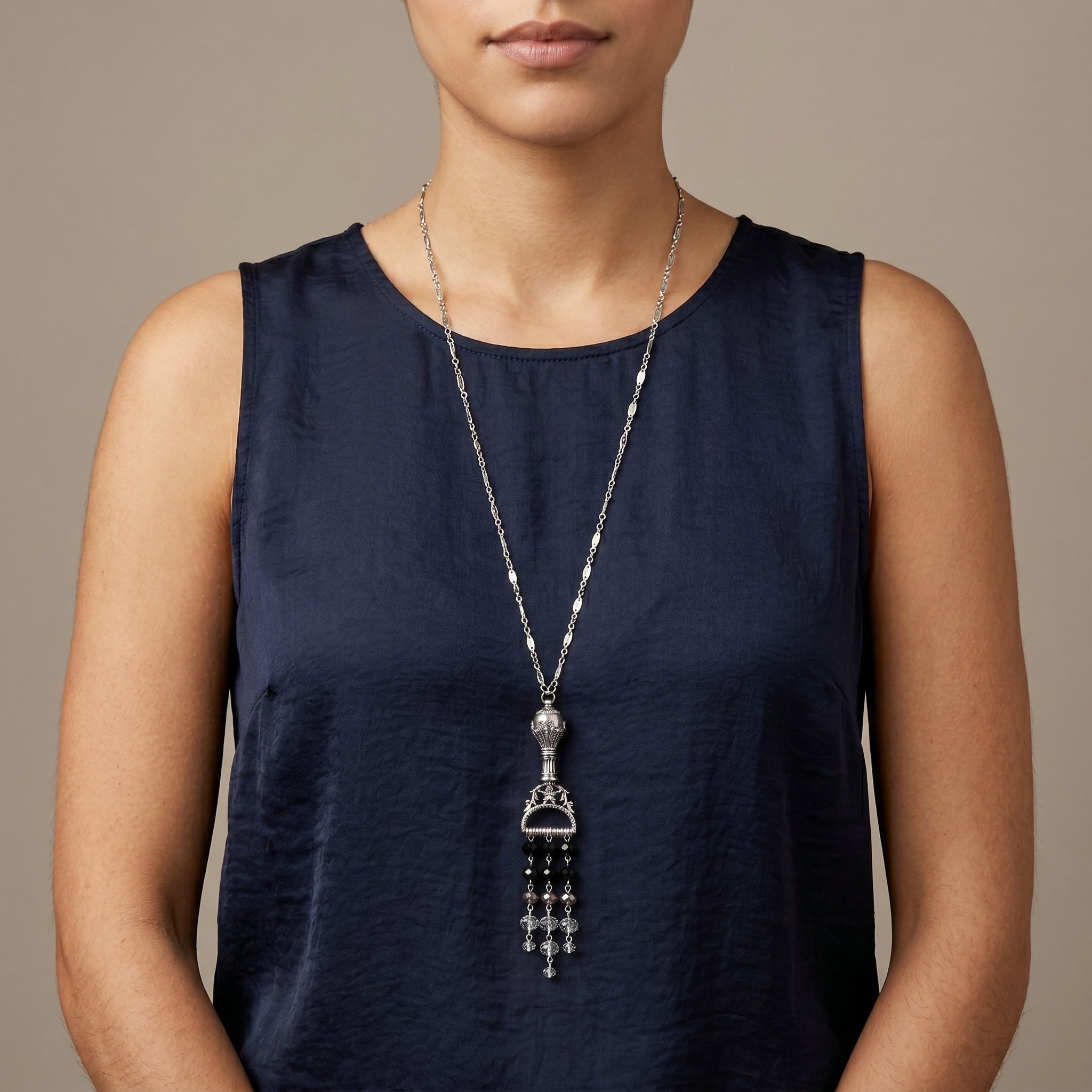 Woman wearing a Multi Black Crystal Chandelier Ornamental Pendant