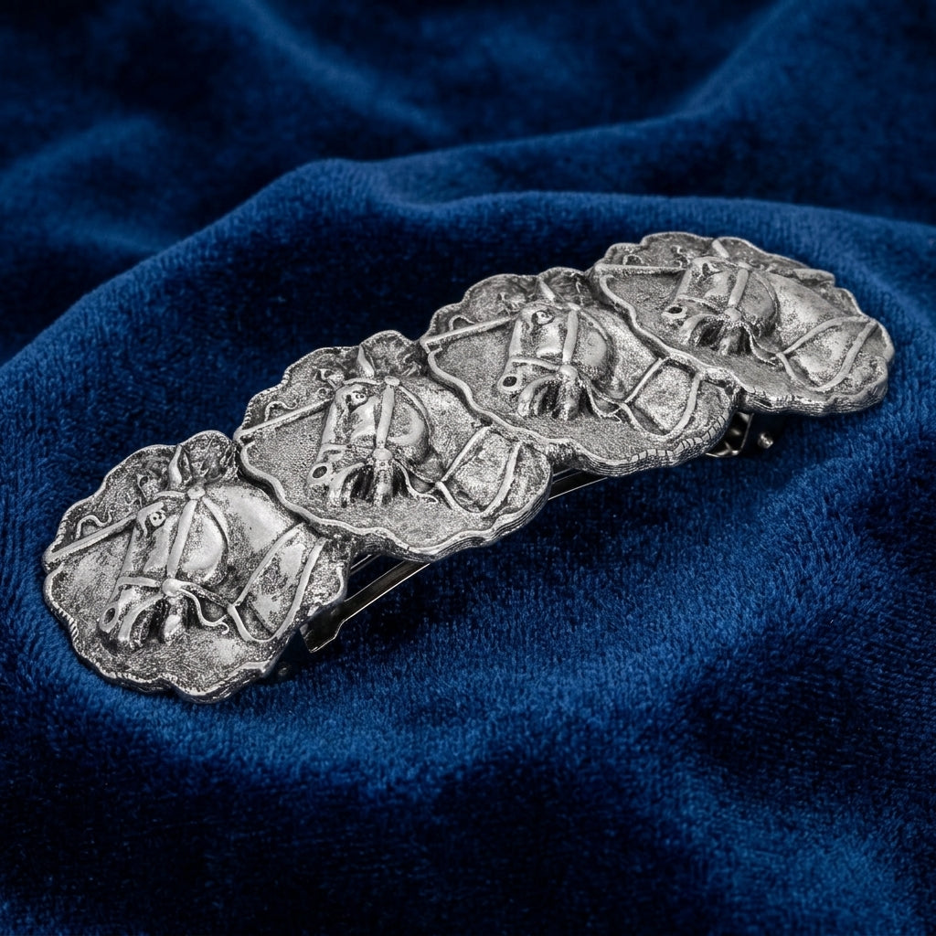 Decorative Equestrian Race Horses Antiqued Hair Barrette on a blue fabric background