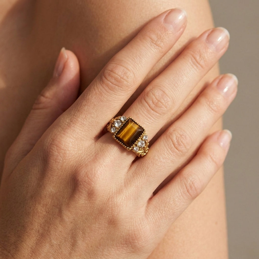 Hand wearing a Tigers Eye Gemstone Crystal Accent Ring