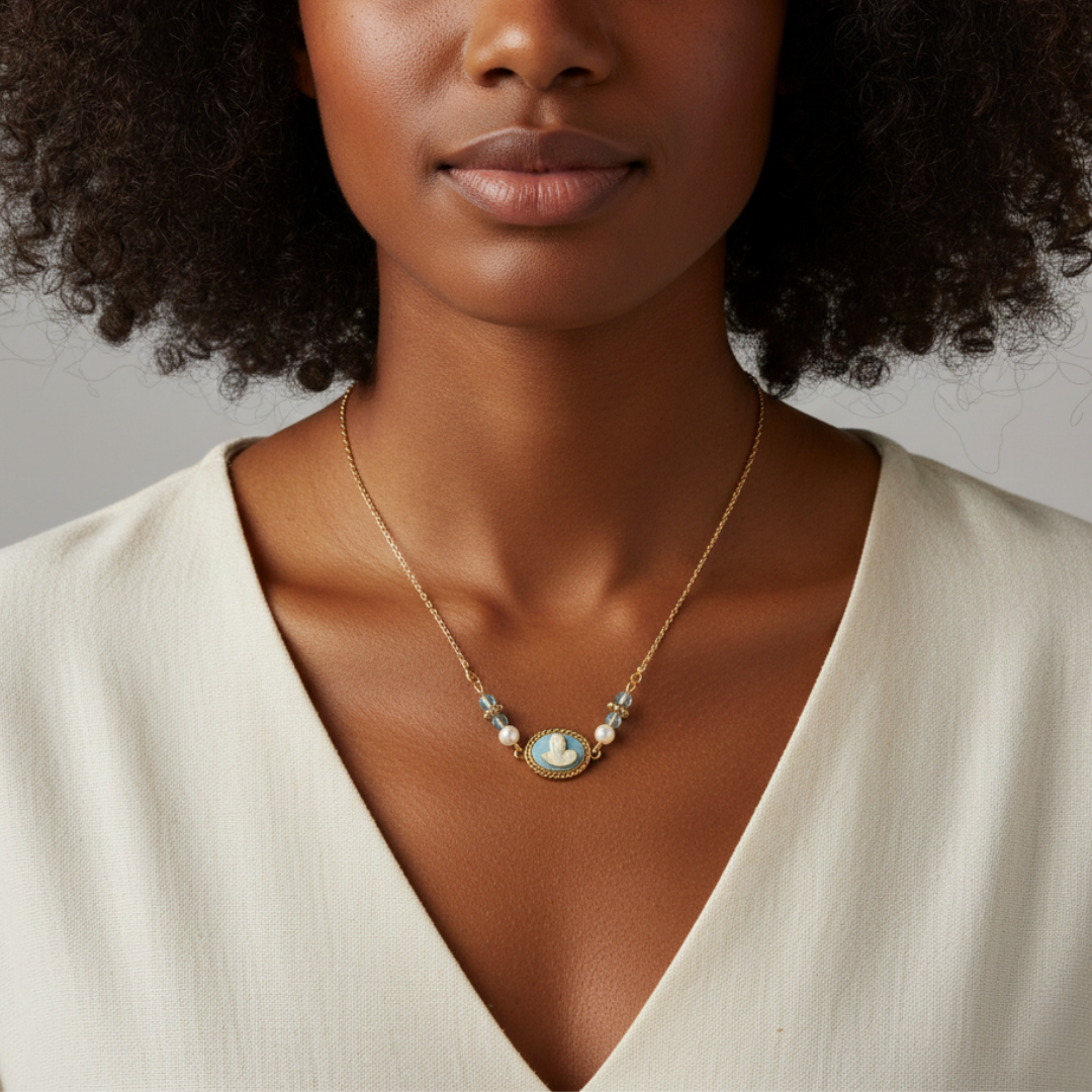 Woman wearing a gold necklace with a pendant against a neutral background