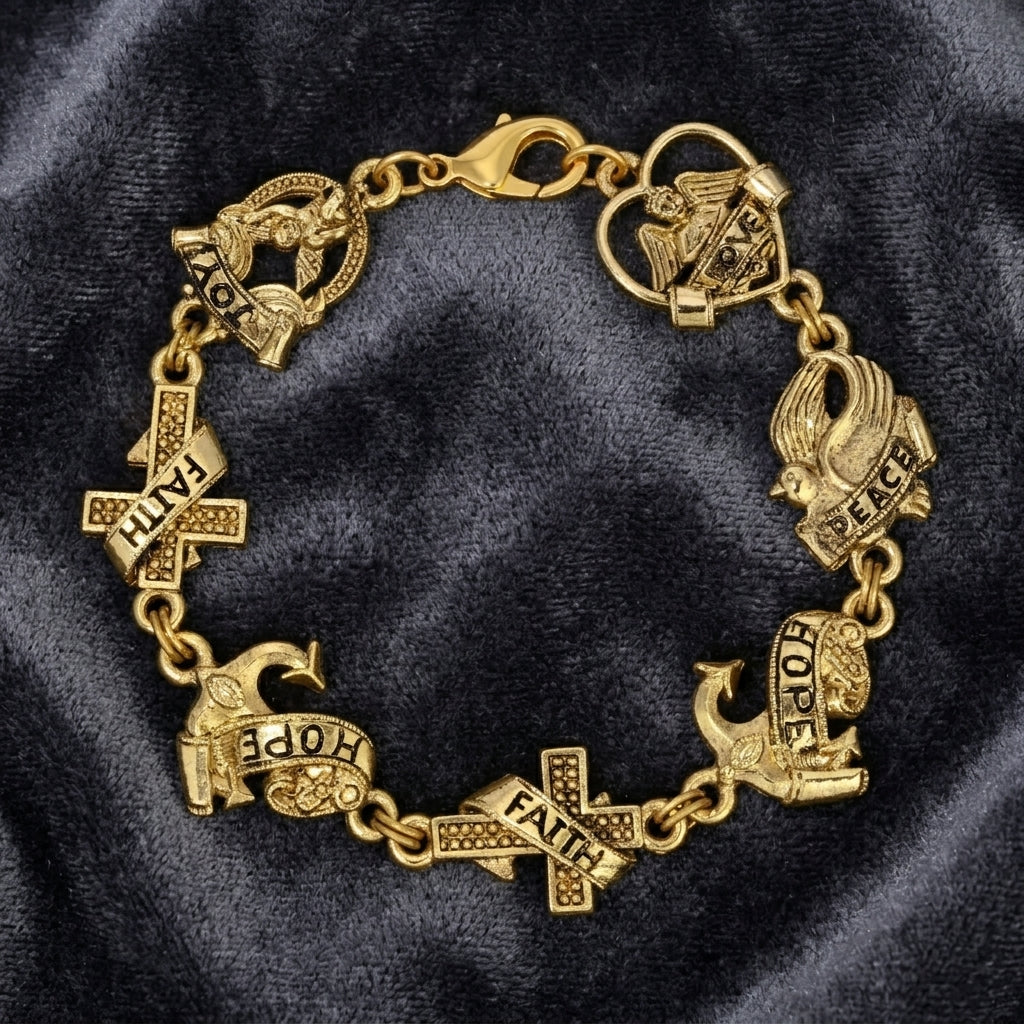 Gold bracelet with various religious and inspirational charms on a dark fabric background