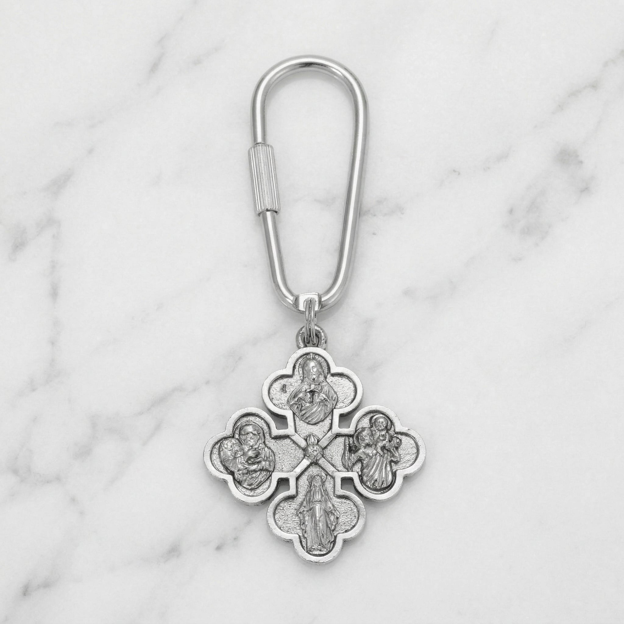 SIlver Four Ways of Devotion keychain on marble
