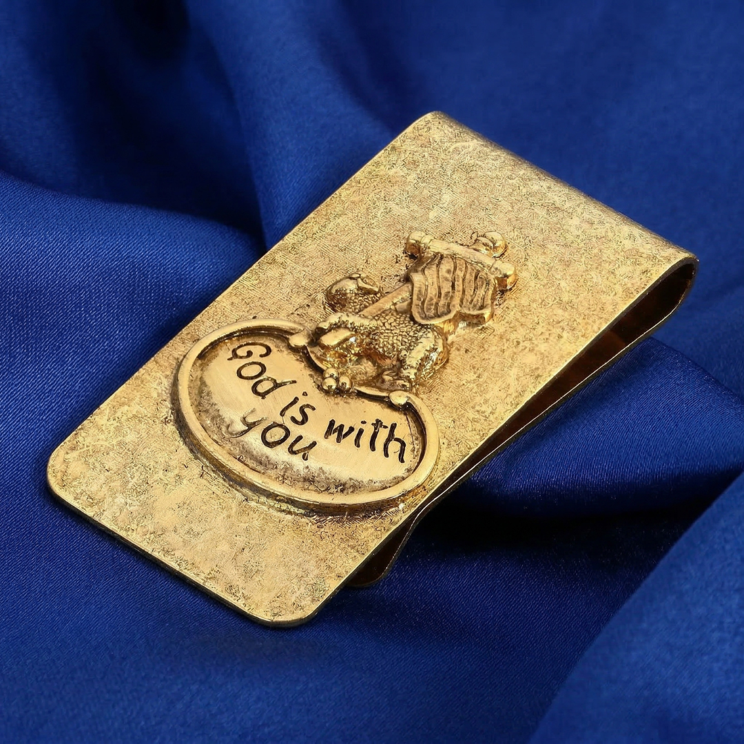 Gold "God is with you" engraved money clip on blue satin fabric