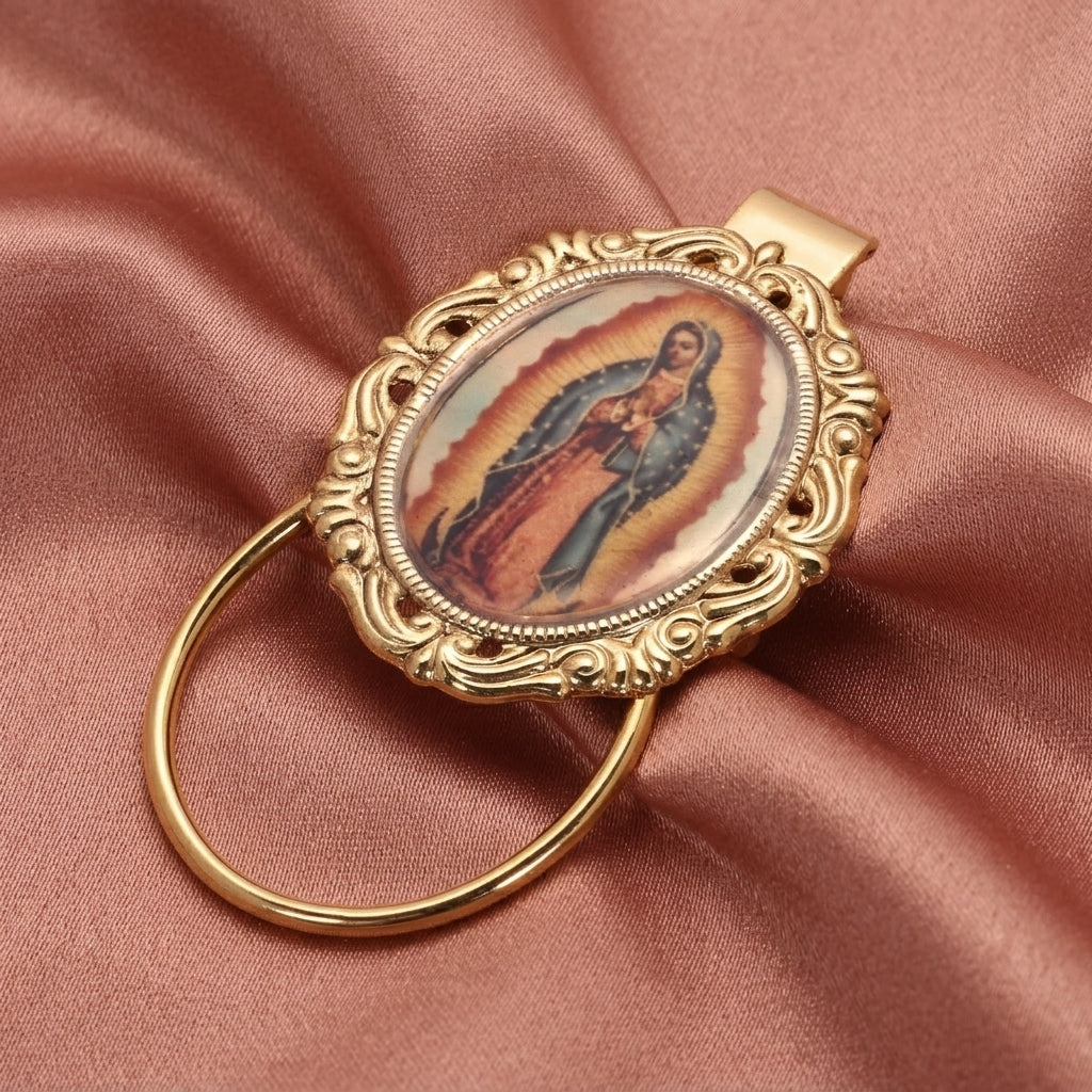 Decorative eyeglass holder with religious icon on a pink fabric background