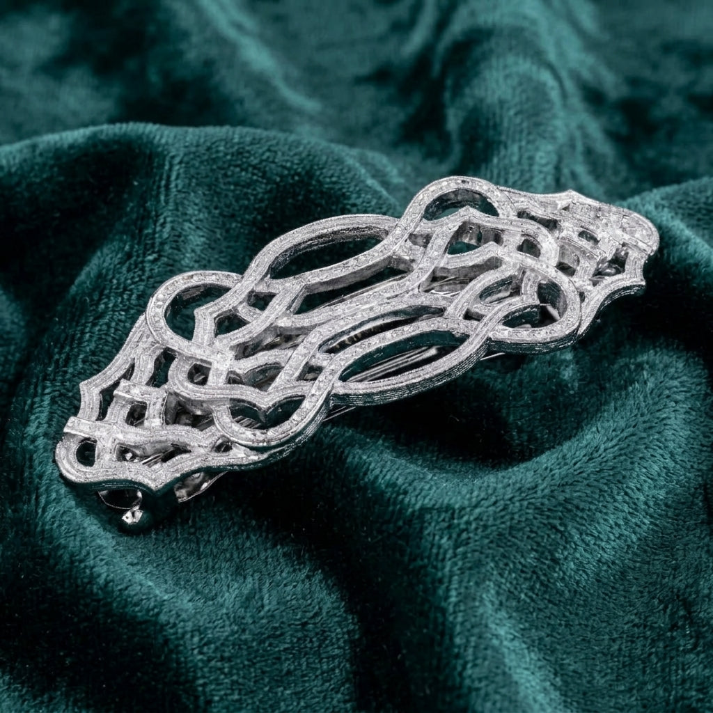 Filigree Art Deco Inspired Hair Barrette on a textured teal fabric background