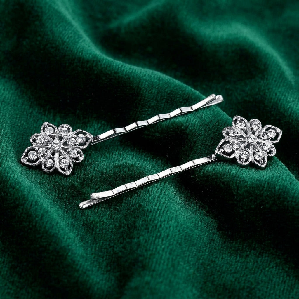 Floral Inspired Crystal Bobby Pin Set on a green fabric background