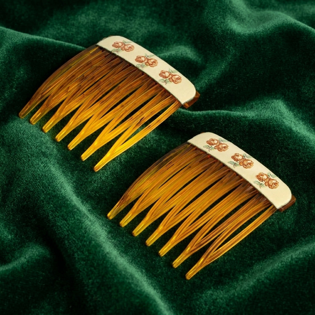 Brown Tortoise Floral Decal Hair Comb Set on a green fabric background