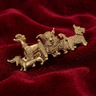 Fab Four-Paws Hair Barrette on a red velvet background