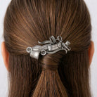 Silver tome Seamstress Essentials Hair Barrette in a person's hair 