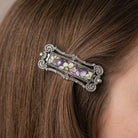 Multicolor Floral Antiqued Hair Barrette on a woman with brown hair