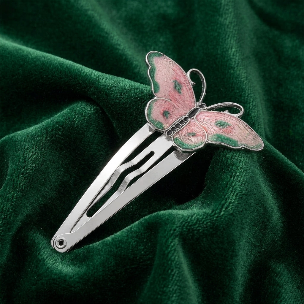 Pink & Green Butterfly Snap Hair Clip on green fabric