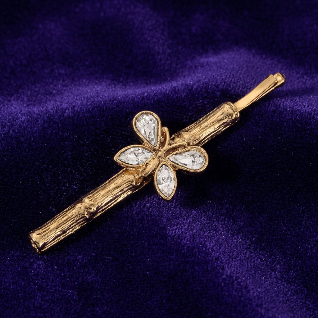 Crystal Butterfly Bobby Pin on dark purple fabric