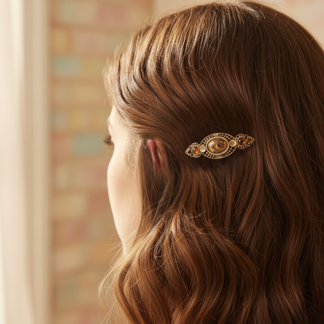 Close-up of a person with a decorative hair clip in their brown hair.