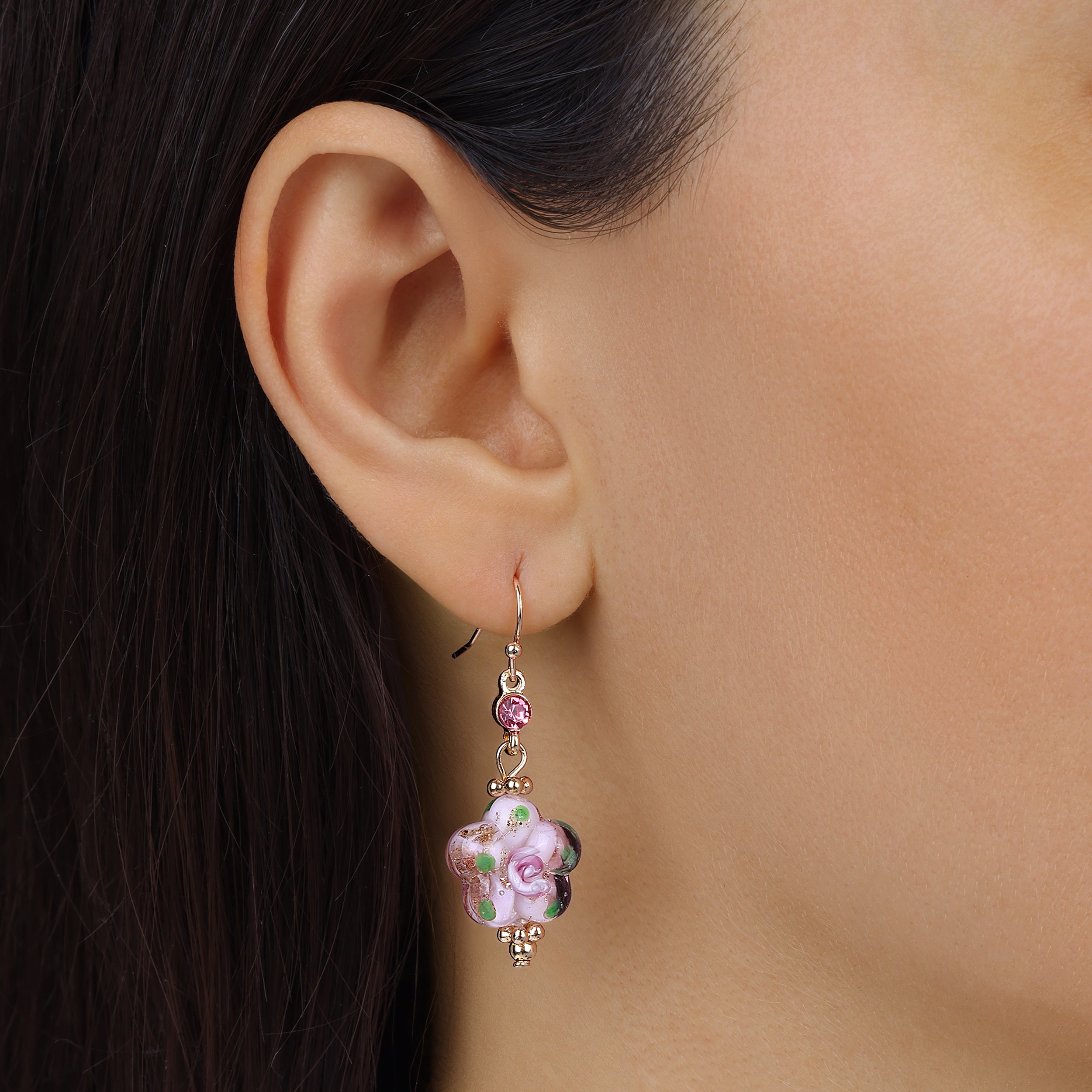 Close up of a woman wearing Pink Blooming Flower Bead & Crystal Drop Earrings