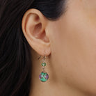 Close up of a woman wearing Golden Rose Blossom Green Bead Drop & Dangle Earrings
