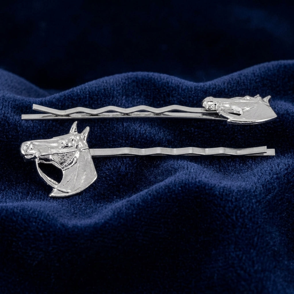 Silver tone Horse Hair Jewelry Bobby Pin Set on a blue fabric background