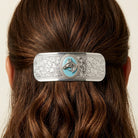 Woman wearing a Southwest Turquoise Enamel Horse Head Floral Hair Barrette in her hair