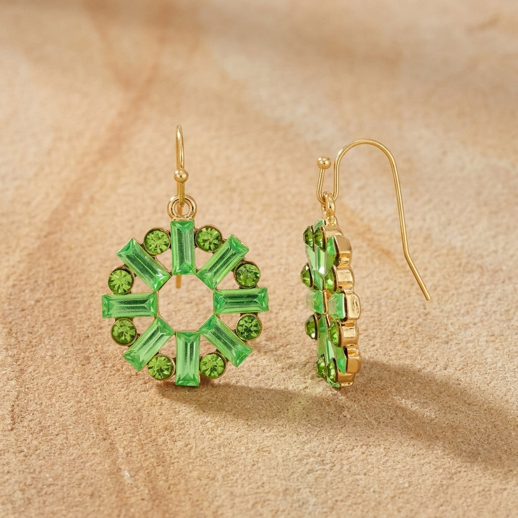 Round Art Deco Inspired Peridot Green Baguette Drop Earrings on sandstone surface