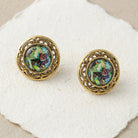 Winery Grapes Decal Round Post Earrings displayed on a textured off-white paper surface.
