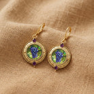Winery Purple Grapes Amethyst Stone Accent Drop Earrings on tan linen