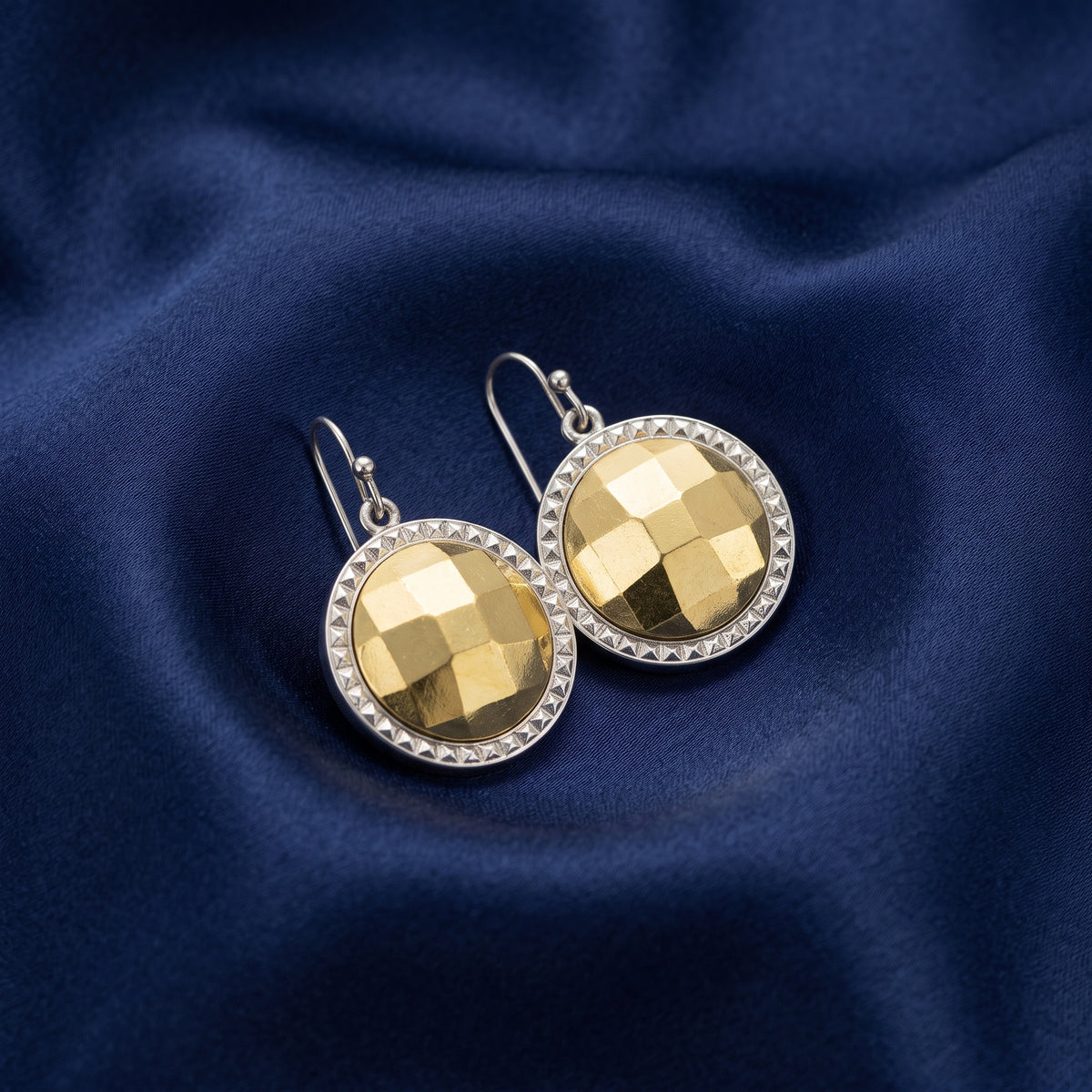Fusion Lux Stone Round Euro Drop Earrings on navy blue satin fabric