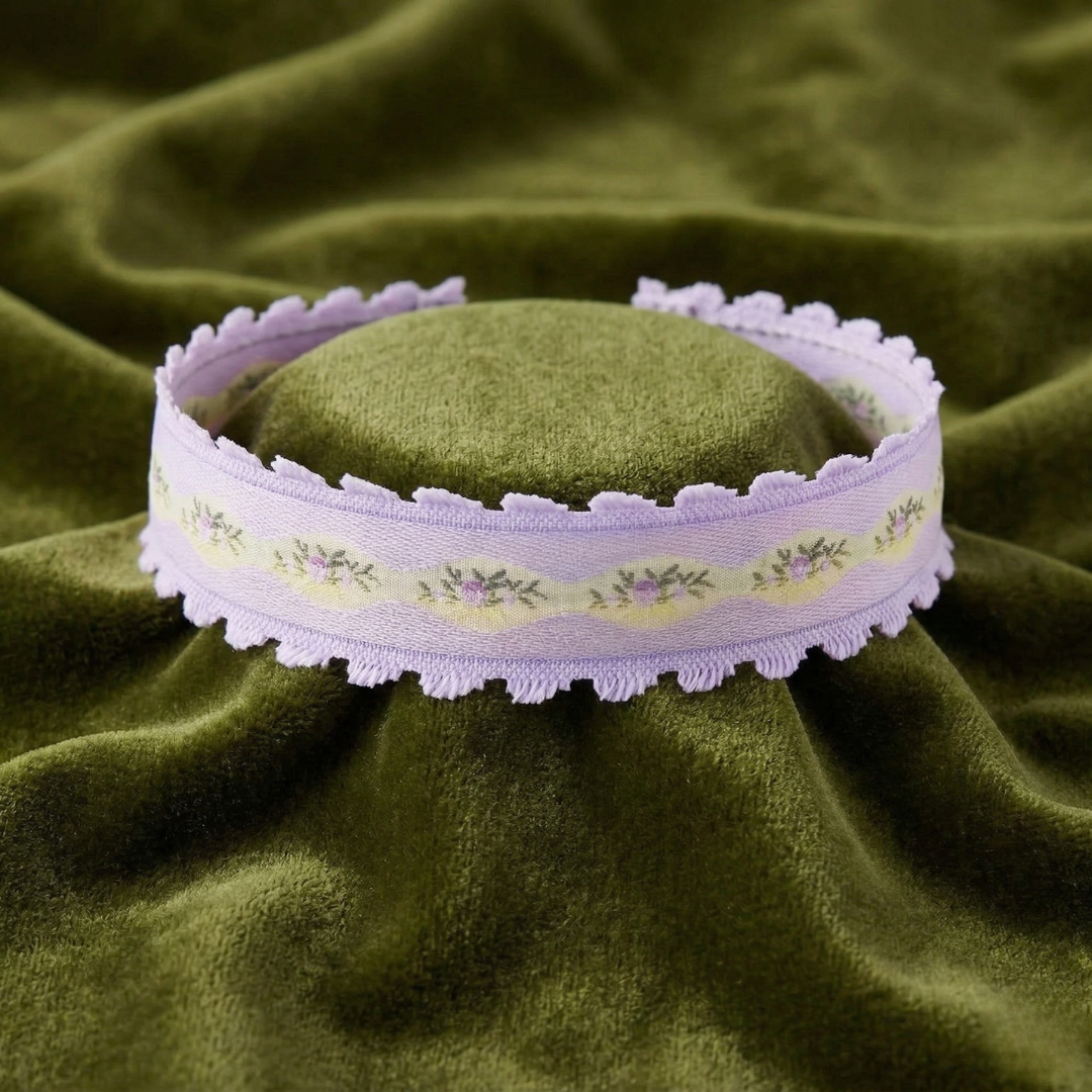 Purple Trim And Light Rose Floral Choker Necklace 12" + 5" Extender on green satin fabric 