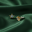 Round Light Sapphire Crystal Star Stud Earrings on green fabric