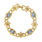 1928 Jewelry Light Sapphire Blue Navette Crystal Blossom Filigree Link Bracelet