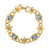 1928 Jewelry Light Sapphire Blue Navette Crystal Blossom Filigree Link Bracelet