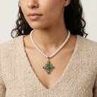 Pearl Strand Multi Crystal Filigree Pendant Necklace worn by a woman with a textured beige top against a neutral background