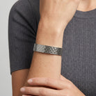Close up of a woman's wrist wearing a Silver Infinite Stretch Bracelet
